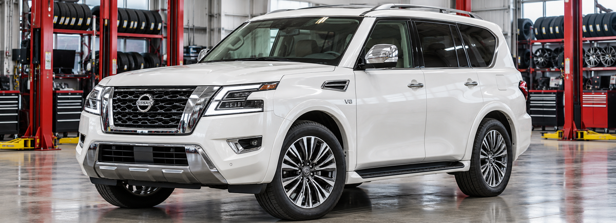Nissan Armada II Y62 Platinum 5.6L 2022-2023 en un taller de llantas