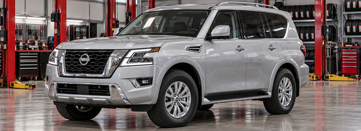 Nissan Armada II Y62 SV 5.6L 2022 en un taller de llantas