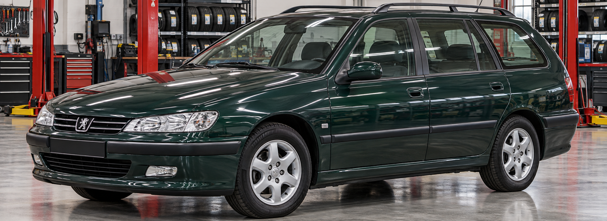 Peugeot 406 Break 2.0L 1999-2002 en un taller de llantas